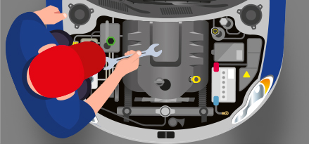 En tekniker reparerer deler under panseret