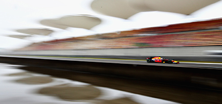 Racing car driving on track