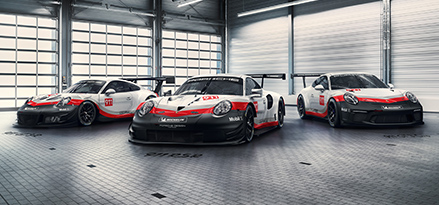 Porsche driving down street